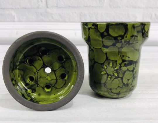 603566c798f7a0c082f272bb11474068 Solaris Eva – Green and Black - Image 1